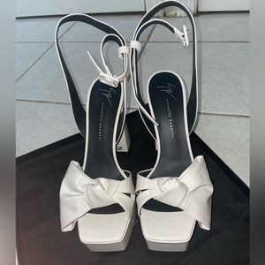 Giuseppe heels 
Never been worn 
original box/everything that came in box